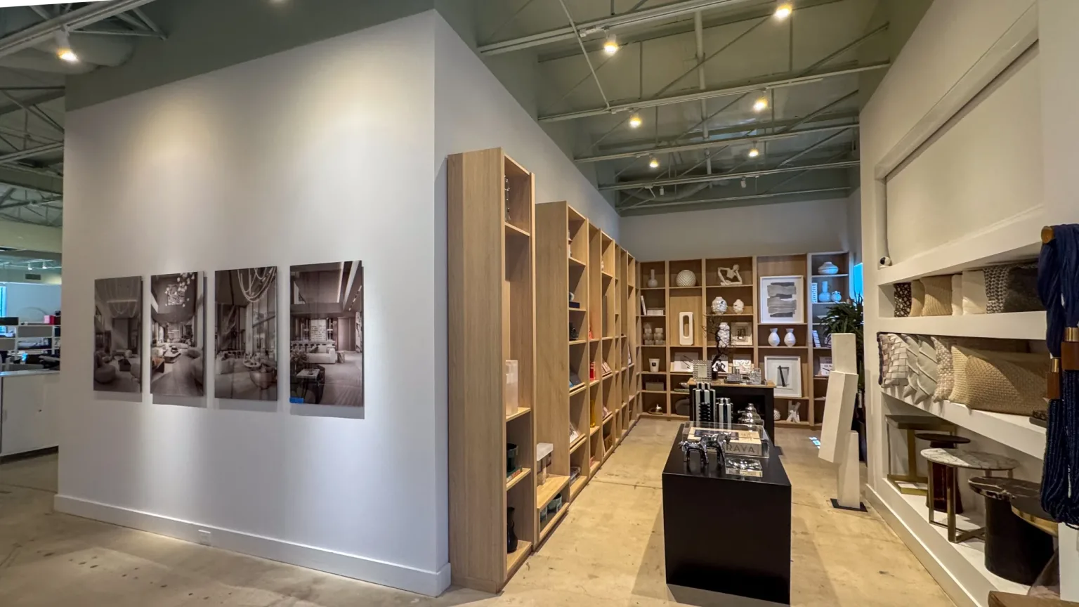 Interior with a gallery wall, open shelving and a central display