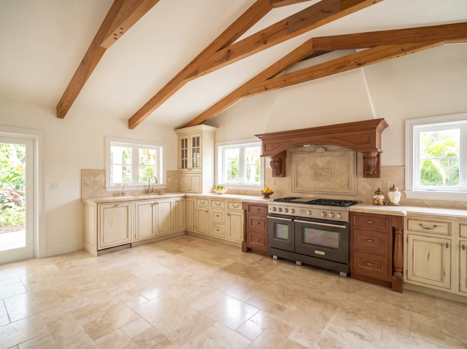 Kitchen with exposed ceiling beams, wood cabinetry and a central island